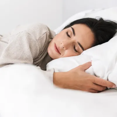 woman sleeping in bed bug free bed